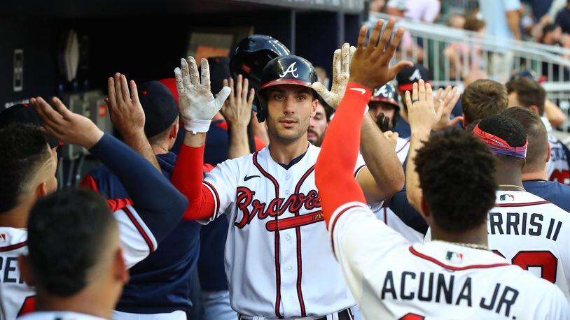 Braves first baseman Matt Olson gets five from Ronald Acuna and teammates hitting a three-run homer to take a 5-4 lead over the San Francisco Giants during the third inning of a MLB baseball game on Tuesday, June 21, 2022, in Atlanta.     “Curtis Compton / Curtis.Compton@ajc.com”