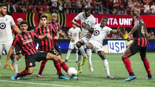 ATLANTA, GA - AUGUST 27: Ike Opara #3, Abu Danladi #99 of Minnesota United and Miles Robinson #12, Franco Escobar, Ezequiel Barco #8 and Florentin Pogba #4 of Atlanta United battle for the ball during the second half of the U.S. Open Cup Final at Mercedes-Benz Stadium on August 27, 2019 in Atlanta, Georgia. (Photo by Carmen Mandato/Getty Images)