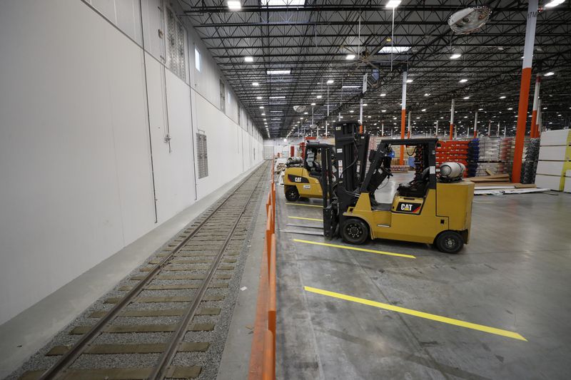 Home Depot's Stonecrest warehouse has a train track where rail cars arrive loaded with material, which requires skilled labor for unloading. Miguel Martinez / miguel.martinezjimenez@ajc.com
