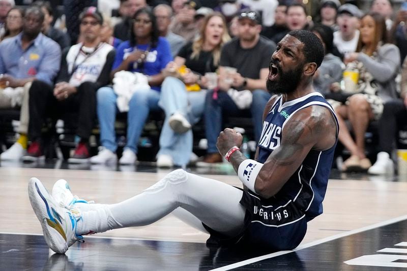 Dallas Mavericks guard Kyrie Irving celebrates after scoring during the second half in Game 5 of an NBA basketball first-round playoff series against the Los Angeles Clippers Wednesday, May 1, 2024, in Los Angeles. (AP Photo/Mark J. Terrill)
