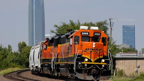 FILE - A BNSF locomotive heads south out of Oklahoma City, Sept. 14, 2022. BNSF will become the second major freight railroad to allow some of its employees to report safety concerns anonymously through a federal system without fear of discipline, the Federal Railroad Administration announced Thursday, April 25, 2024. (AP Photo/Sue Ogrocki, File)