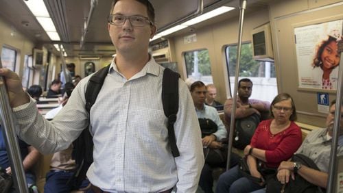 Ryan Esslinger (left) of Dunwoody, would love to take MARTA more often. But he finds himself using it less instead. Transit ridership is declining in Atlanta and across the country. ALYSSA POINTER/ATLANTA JOURNAL-CONSTITUTION