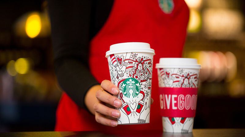 Starbucks 2017 holiday cups photographed on Monday, October 23, 2017.  Some say the cups depict a gay couple, which the company would not confirm or deny.