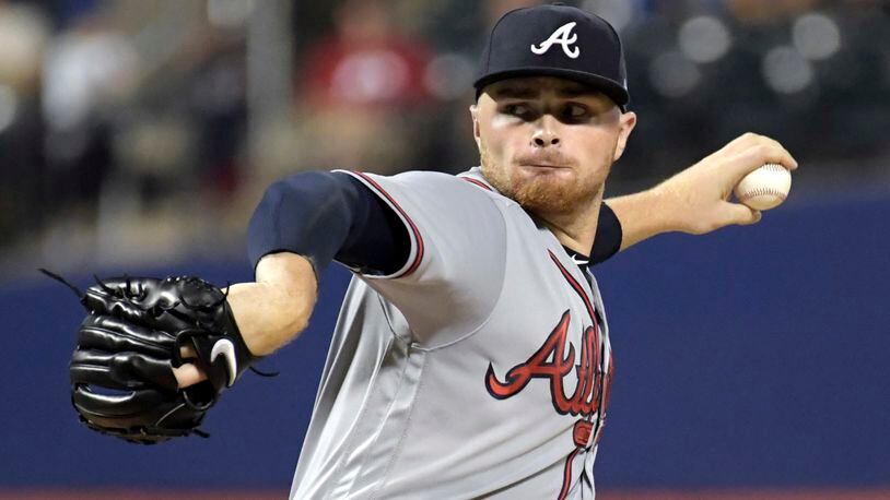 Braves pitcher Sean Newcomb delivers against the Mets. (AP Photo/Bill Kostroun)