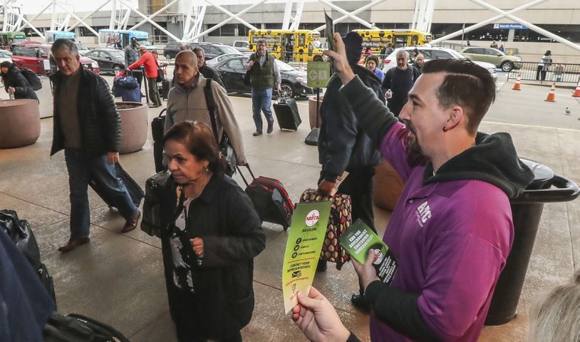 PHOTOS: Atlanta airport travelers stuck in long TSA wait lines