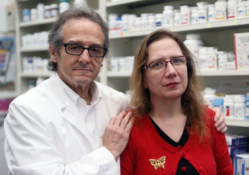 Ira Katz (left) and Desiree Cross have both reversed overdoses of people on the sidewalk outside their pharmacy, which has been in Little Five Points for 37 years. Katz owns the drugstore, and Cross is his assistant. Like Katz and Cross, regular citizens armed with Narcan are saving the lives of people who overdose on opioids. BOB ANDRES /BANDRES@AJC.COM