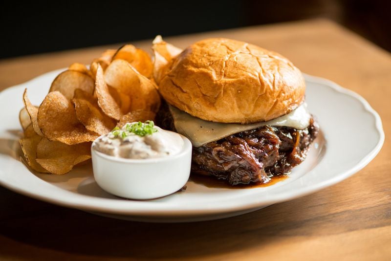 If you want a burger that will remind you of French onion soup, Achie’s Wagyu burger has caramelized onions, French onion jus, Gruyere and a brioche bun. CONTRIBUTED BY MIA YAKEL