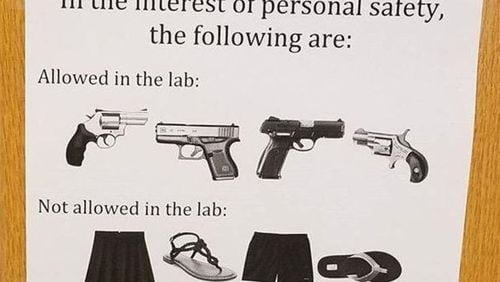 Someone posted this sardonic sign on the door to a lab at the University of Georgia earlier this year to mark the new campus carry law.