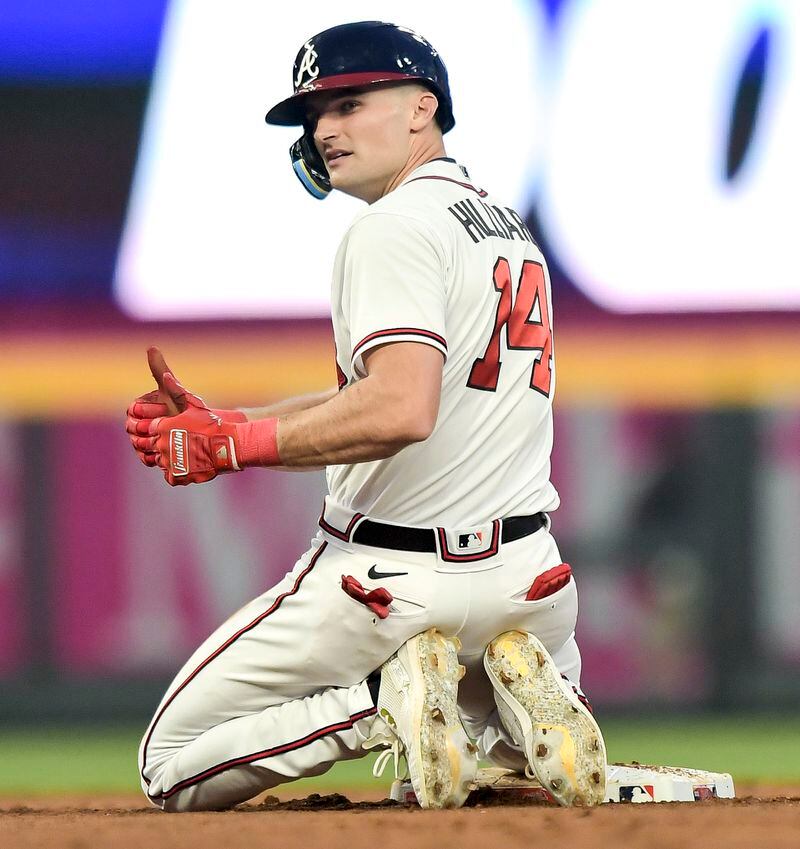 Atlanta Braves center fielder Sam Hilliard (14) gives a thumbs up after making it safely into second base in the third inning of the game Tuesday, April 11, 2023 at Truist Park in Atlanta. (Daniel Varnado / For the AJC)