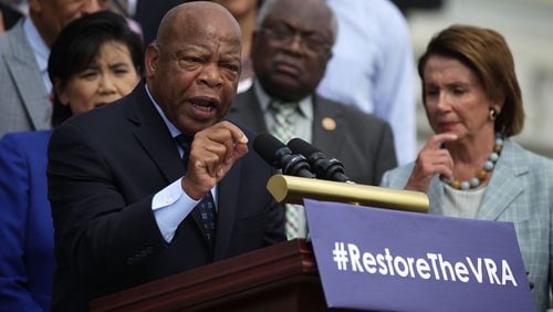 U.S. Rep. John Lewis (D-GA) speaks at a rally to commemorate the 50th anniversary of the Voting Rights Act in July 2015.  (Photo by Alex Wong/Getty Images)