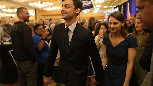 ATLANTA, GA - APRIL 18: Democratic candidate Jon Ossoff walks with his girlfriend Alisha Kramer after speaking to his supporters as votes continue to be counted in a race that was too close to call for Georgia's 6th Congressional District in a special election to replace Tom Price, who is now the secretary of Health and Human Services on April 18, 2017 in Atlanta, Georgia. The winner of the race would fill a congressional seat that has been held by a Republican since the 1970s. (Photo by Joe Raedle/Getty Images)