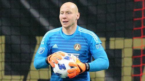 Atlanta United goalkeeper Brad Guzan after blocking a shot on goal by Sporting Kansas City during the first half in a MLS soccer match on Wednesday, May 9, 2018, in Atlanta. Guzan was red carded and ejected later in the game.  Curtis Compton/ccompton@ajc.com