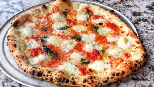 The Margherita pizza continues to set a high standard at Varasano's. Chris Hunt for The Atlanta Journal-Constitution