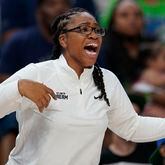 Atlanta Dream head coach Tanisha Wright reacts during the second half of a WNBA basketball game against the Minnesota Lynx, Friday, Sept. 1, 2023, in Minneapolis. The Dream lost 91-85.  (AP Photo/Abbie Parr)