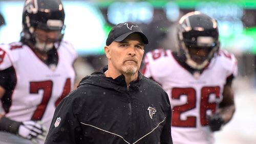 Atlanta Falcons head coach Dan Quinn clocks in for one of the good days at work this season - against the Jets Sunday in New York. (AP Photo/Bill Kostroun)