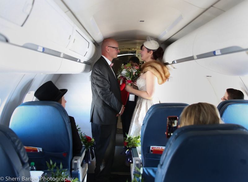 Ken Nilsen and Tracy Bellman got married on a flight Contributed by Delta/Photo taken by Sherri Barber