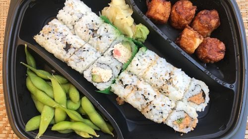 The rice bowl family meal includes four rice bowls along with five fried shumai, edamame, a seafood roll, spicy tuna roll, fried rice and miso soup. Pictured (from left) are the edamame, seafood roll, spicy tuna roll and shumai.