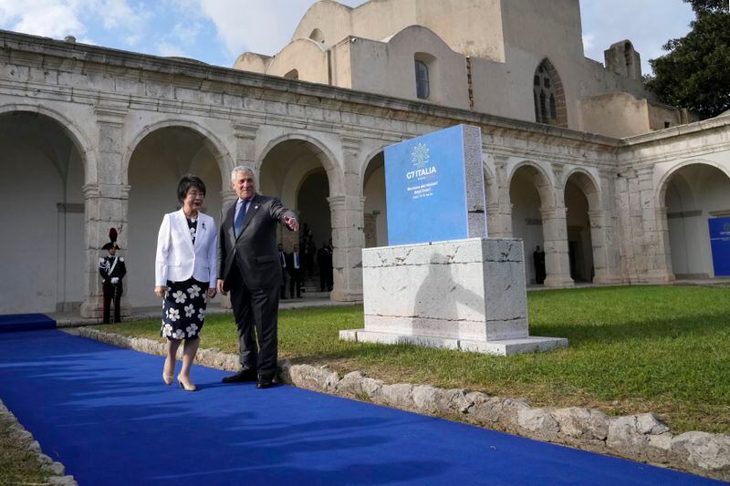 Italian Foreign Minister Antonio Tajani, right, welcomes Japanese Foreign Minister Yoko Kamikawa at the G7 Foreign Ministers meeting, on the Island of Capri, Italy, Wednesday, April 17, 2024. Group of Seven foreign ministers are meeting on the Italian resort island of Capri, with soaring tensions in the Mideast and Russia's continuing war in Ukraine topping the agenda. The meeting runs April 17-19. (AP Photo/Gregorio Borgia)
