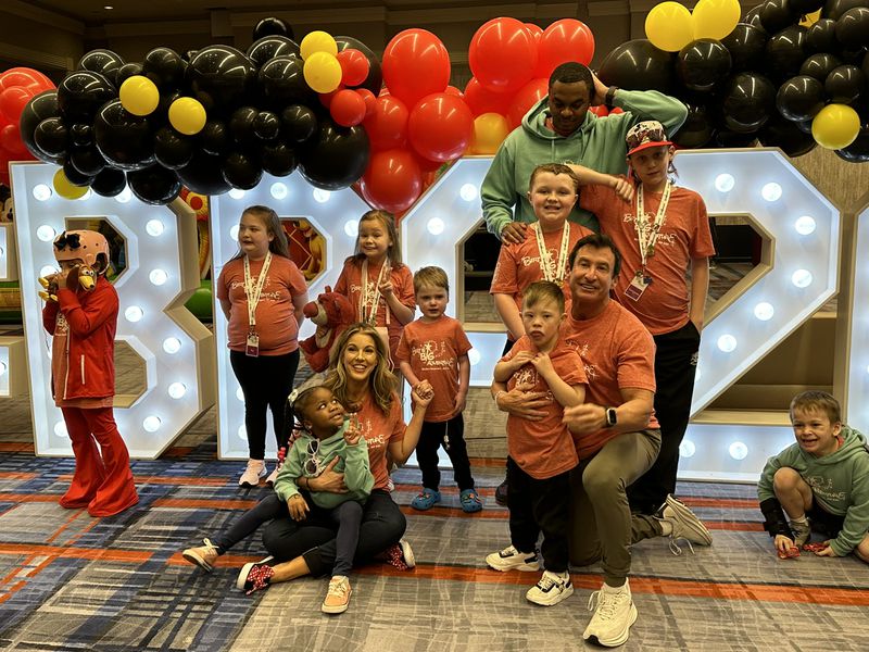 Bert's Big Adventure is now in its 21st year and took a dozen families to Disney in Orlando Feb. 23-26, 2024. Here they are at the kickoff party at the Atlanta Airport Hilton Feb. 23. RODNEY HO/rho@ajc.com