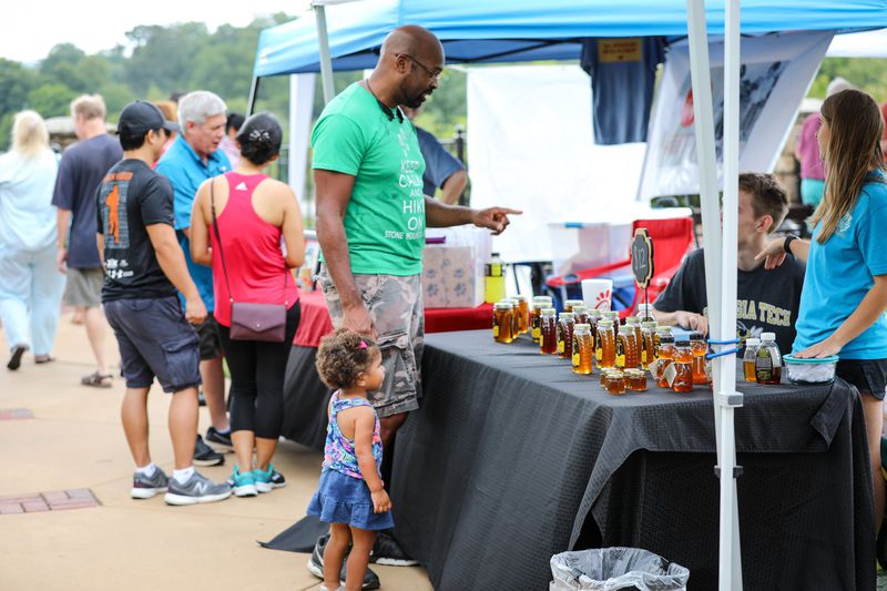 Honey is a popular offering at almost every local farmers market, including this vendor at the Norcross Farmers Market. CONTRIBUTED BY ACCENT CREATIVE