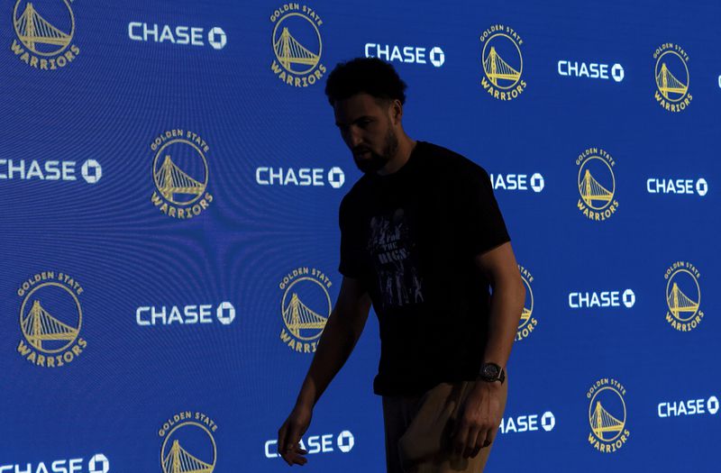 Golden State Warriors' Klay Thompson walks off the stage after speaking to reporters Wednesday, April 17, 2024, in San Francisco. (Carlos Avila Gonzalez/San Francisco Chronicle via AP)