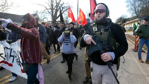 Counter protesters marched in Stone Mountain, Ga., Saturday, Feb. 2, 2019 after the park closed rather than allow a planned white nationalist rally. (Casey Sykes for The Atlanta Journal-Constitution)