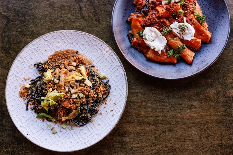 Two of the dishes available at Ilda in Sylva, North Carolina, are squid ink spaghettoni with nduja and crawfish, and rigatoni caponata with burrata and Calabrian peppers. Courtesy of Jackson County Tourism Development Authority