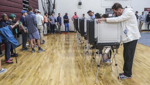 November 6, 2018 Atlanta : Voters waited over an hour to vote at Henry W. Grady High School on Tuesday Nov. 6, 2018. Metro Atlanta polling places reported steady lines as voters went to the polls Tuesday. JOHN SPINK/JSPINK@AJC.COM