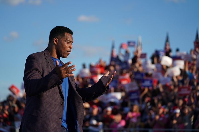 Lines are being drawn within the Georgia GOP as Gov. Brian Kemp and former U.S. Sen. David Perdue clash. That includes U.S. Senate candidate Herschel Walker, who has refused to back Kemp. (Sean Rayford/Getty Images/TNS)