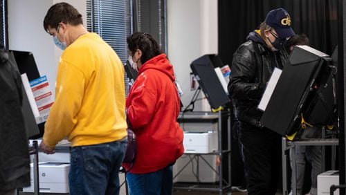 Voters cast their ballots for the U.S. Senate runoff races during early voting at the Cobb County Elections office in Marietta on Saturday, Dec. 19, 2020. (Photo: Ben Gray for The Atlanta Journal-Constitution)