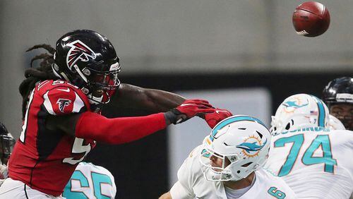 Atlanta Falcons outside linebacker De'Vondre Campbell (59) hits the ball after Miami Dolphins quarterback Jay Cutler (6) passed during the second half of an NFL football game, Sunday, Oct. 15, 2017, in Atlanta. (AP Photo/John Bazemore)