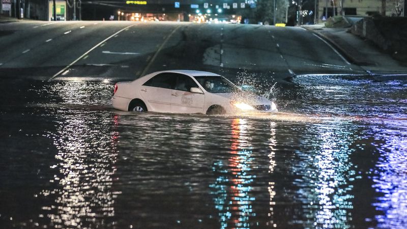 March 7, 2018 DeKalb County: This driver ignored road closed signs and preceded to drive into the deep water on Buford Highway. She successfully retreated and returned to the direction previously driven. Buford Highway was flooded just north of I-285 in DeKalb County due to a water main break on Wednesday, March 7, 2018. Water began flowing across the roadway in Doraville just before 4:30 a.m.,Â according to theÂ WSB 24-hour Traffic Center. The break is impacted services across DeKalb, which was put under a boil water advisory. DeKalb Medical rescheduled elective surgeries. City Schools of Decatur were closed. Several businesses were flooded. And multiple cities reported water outages. A reporter asked DeKalb CEO Michael Thurmond when service would be restored. âAs soon as humanly possible,â he said. âWeâd like to have this resolved within 24 hours.âÂ Thurmond said the break was the result of a structural failure. Perimeter Mall and Emory University closed due to the water main break. JOHN SPINK/JSPINK@AJC.COM