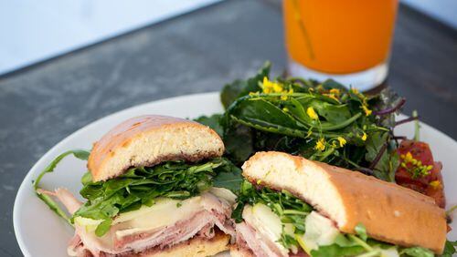 The Sarah-Witch with brie, Beech Creek pink lady apples, shaved ham, arugula and house preserves is served on a southern baguette. Contributed by Mia Yakel