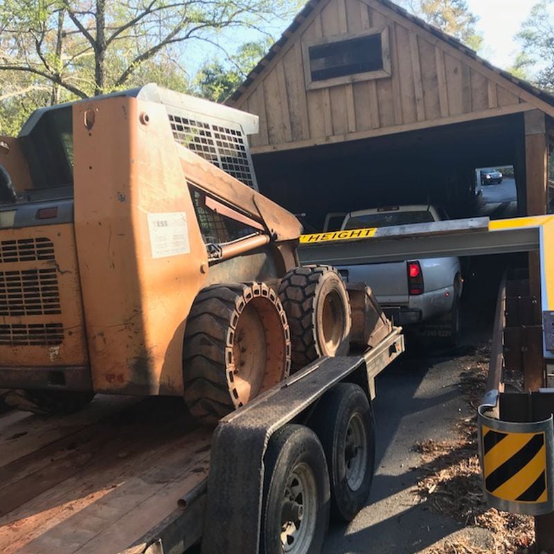 This is from April 11, 2018, when Alfredo Tello tried to drive the construction equipment he was hauling through the Concord Road Covered Bridge. It didn't work. (Photo courtesy of Cobb County Government)