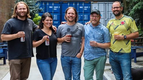 Keeping Monday Night Brewing successful a decade later are (from left to right) brewmaster Peter Kiley, COO Rachel Kiley, CEO Jeff Heck, founder Jonathan Baker, CPO Joel Iverson.
(Courtesy of Ali Lamoureux / Monday Night Brewing)