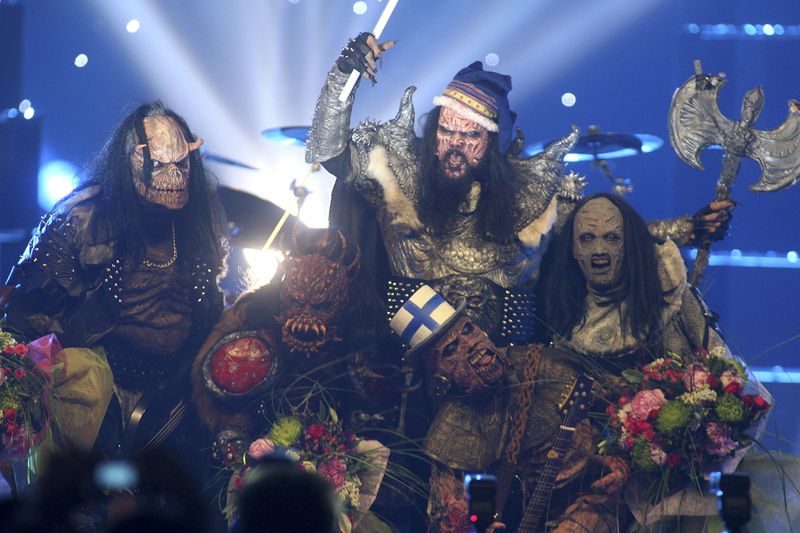 FILE - Finnish group Lordi celebrate after their victory in the Eurovision Song Contest at the Indoor Olympic stadium in Athens, Greece, May 21, 2006. The 68th Eurovision Song Contest is taking place in May in Malmö, Sweden. It will see acts from 37 countries vie for the continent’s pop crown. Founded in 1956, Eurovision is a feelgood extravaganza that strives to banish international strife and division. It’s known for songs that range from anthemic to extremely silly, often with elaborate costumes and spectacular staging. (AP Photo/Petros Giannakouris, File)
