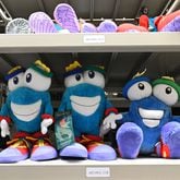 Plush versions of Izzy, the mascot of the 1996 Atlanta Olympics, sit in a storage facility at the Atlanta History Center on Tuesday, July 20, 2021. The history center has an ongoing exhibit about the 1996 Olympic Games in Atlanta. (Hyosub Shin / Hyosub.Shin@ajc.com)
