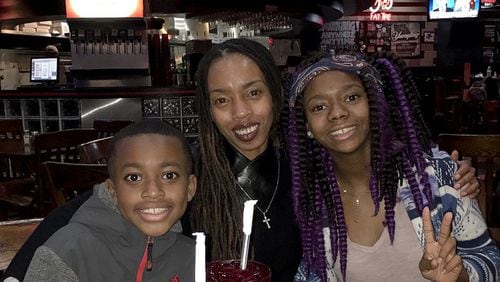 Claudine Hargrove, 38, was stabbed to death Aug. 11 inside a Gwinnett County hotel room two days after her birthday. She is survived by her 11-year-old son Naiyim and her 15-year-old daughter Nya. (Family provided photo)