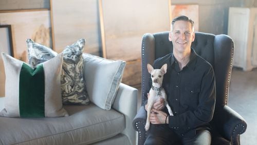 Designer Jimmy Stanton is the owner of Stanton Home Furnishings, located in Atlanta’s Westside Design District. He is shown with Champ, his chihuahua. Contributed by Jeff Roffman Photography