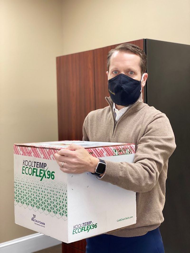 Steve Vincent, an executive at Gold Cross EMS in Augusta, prepares to begin vaccination of medics who transport patients to hospitals. “The hospitals are full,’' he said. “There’s no denying the wait times are getting a little longer.” (Contributed photo)