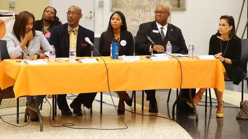 Rashida Winfrey (from left) Tony L. Burks, Adzua Agyapon, Byron Amos and Michelle Olympiadis-Constantinides -- a few of the candidates for District 2 and District 3 seats on the Atlanta Board of Education -- address the audience during an August election forum.    Curtis Compton/ccompton@ajc.com