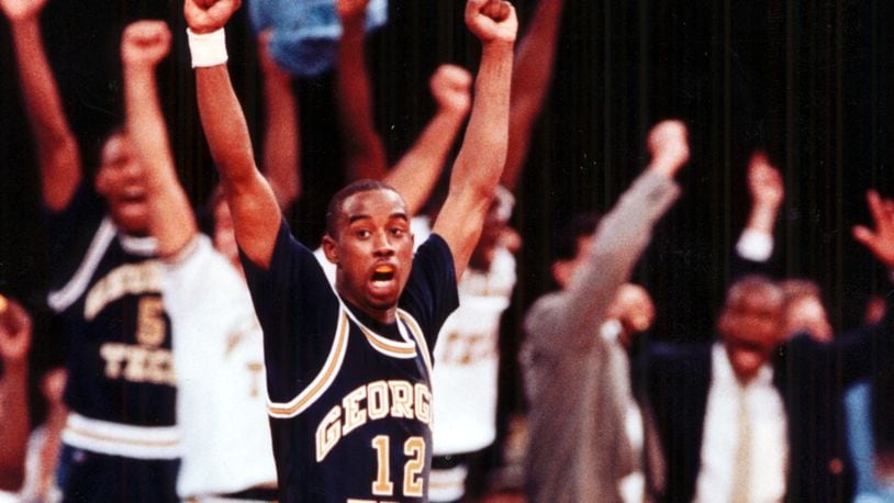 Georgia Tech guard Kenny Anderson (12) celebrates the shot that sent the game into overtime. (AJC file photo by Michael A. Schwarz)
