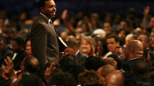 110207-COLLEGE PARK: Dr. Creflo Dollar Jr. speaks during funeral services for HERO driver Spencer Pass at World Changers Church International in College Park on Monday, Feb. 7th. The 45-year-old Highway Emergency Response Operator was killed on the job while helping a stranded motorist. Troopers & HERO units from Georgia, Tennessee, North Carolina & South Carolina joined a long procession from the church to Forest Hills Cemetery in Forest Park. Phil Skinner pskinner@ajc.com editor's note: CQ