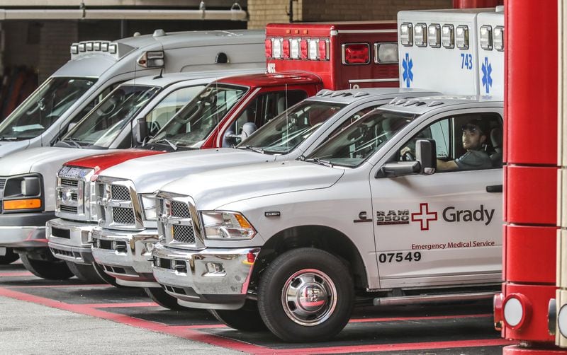 Ambulances are lined up at Grady Hospital in Atlanta. JOHN SPINK/JSPINK@AJC.COM