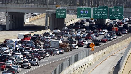 MAY 23, 2014 Traffic starts to get congested on the connector in downtown Atlanta during the evening rush hour as commuters leave for the holiday weekend Friday, May 23, 2014. KENT D. JOHNSON/KDJOHNSON@AJC.COM