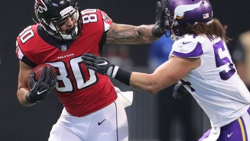 Falcons tight end Levine Toilolo picks up a first down against the Vikings in a NFL football game on Sunday, December 3, 2017, in Atlanta.  Curtis Compton/ccompton@ajc.com