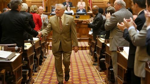April 2, 2015 Atlanta: Gov. Nathan Deal makes his way out of the House chamber after thanking the representatives for their work on the last day of the 2015 legislative session Thursday evening April 2, 2015. Ben Gray / bgray@ajc.com Gov. Nathan Deal makes his way out of the House chamber after thanking the representatives for their work on the last day of the 2015 legislative session on Thursday evening. Ben Gray, bgray@ajc.com