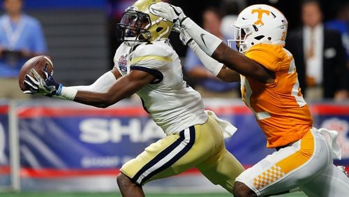 ATLANTA, GA - SEPTEMBER 04:  Qua Searcy #1 of the Georgia Tech Yellow Jackets pulls in this reception against Micah Abernathy #22 of the Tennessee Volunteers at Mercedes-Benz Stadium on September 4, 2017 in Atlanta, Georgia.  (Photo by Kevin C. Cox/Getty Images)