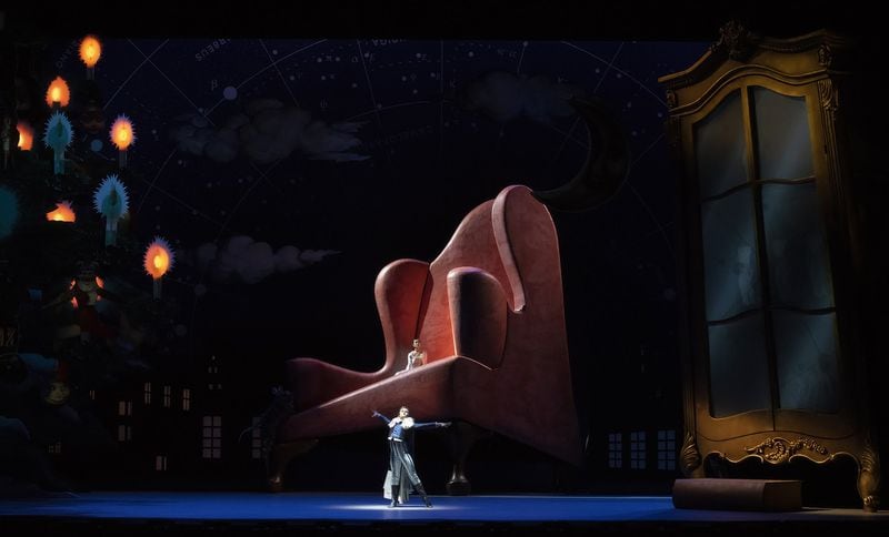 Drosselmeier (Nikolas Gaifullin) orchestrates giant shifts in Marie’s (Airi Igarashi) perceived reality in Atlanta Ballet’s “The Nutcracker,” choreographed by Yuri Possokhov. Contributed by Gene Schiavone. Courtesy of Atlanta Ballet