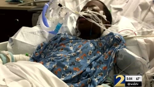 Sanquon King, 8, remains in critical condition after he accidentally set himself on fire in Covington.